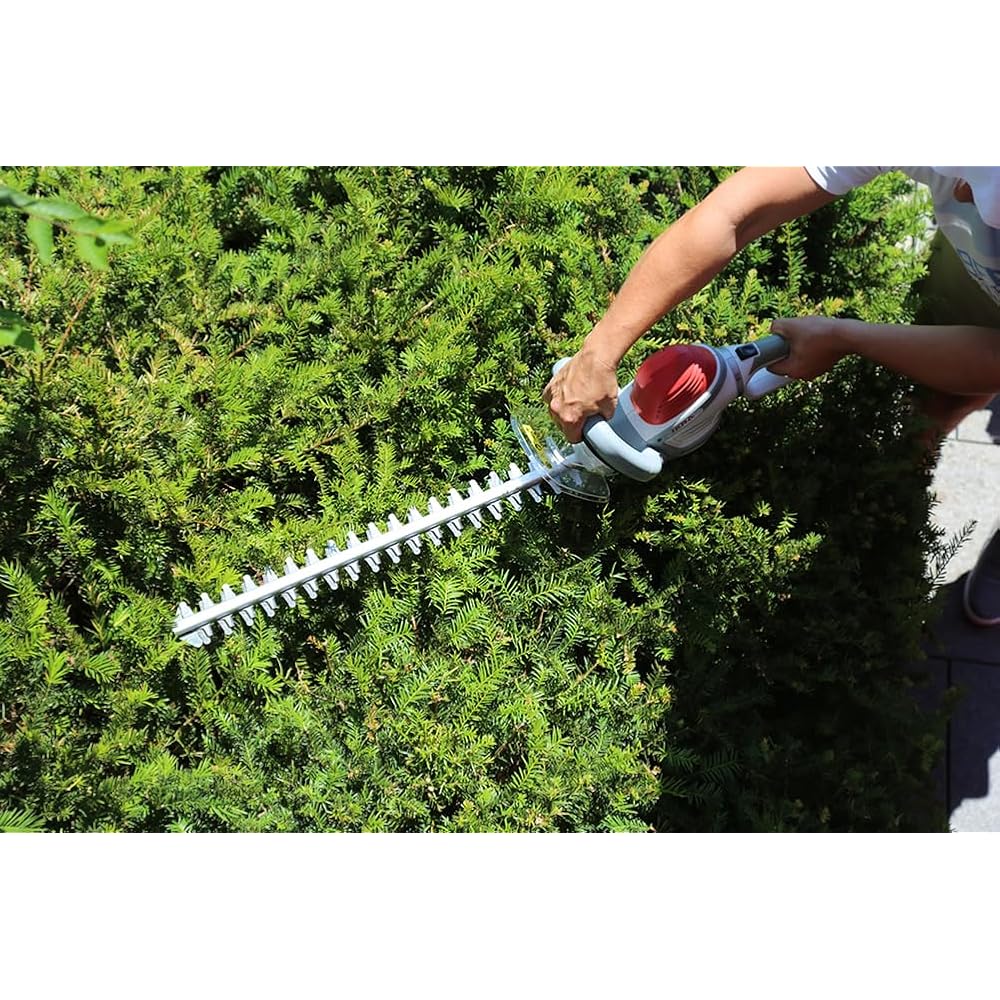 IKRA taille-haie électrique IHS 650 longueur de coupe 55cm, ecartement 22mm, 650W, poignée tournante à 180° : Jardin