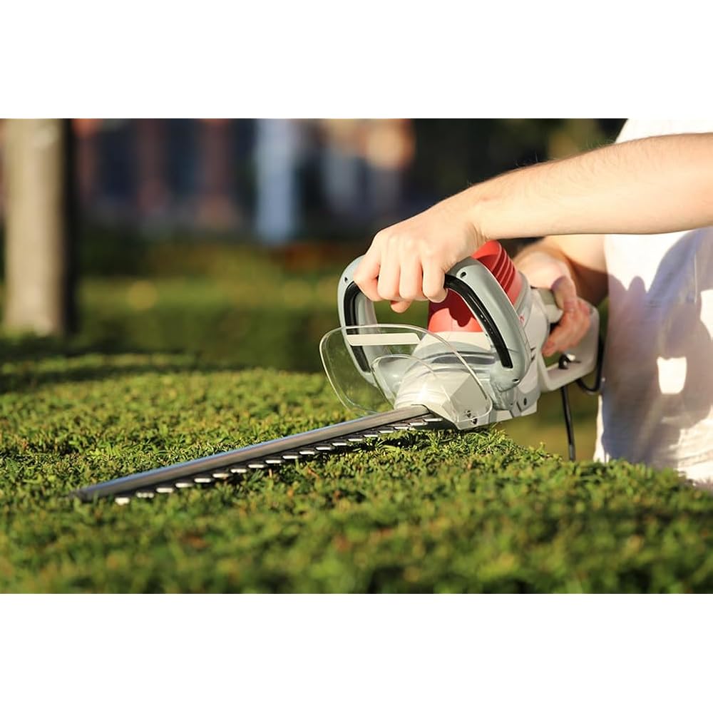 IKRA taille-haie électrique IHS 650 longueur de coupe 55cm, ecartement 22mm, 650W, poignée tournante à 180° : Jardin