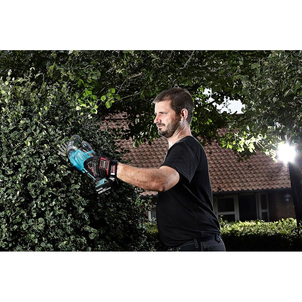 Makita DUM604RFX Cisaille à gazon à batterie 18 V : Jardin